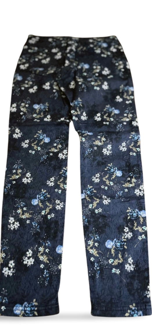 Blue trousers with floral decoration