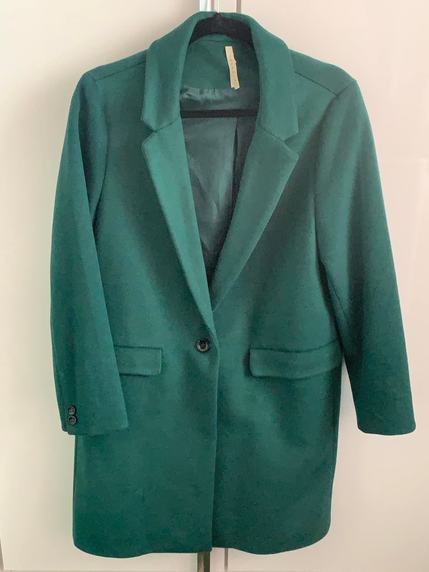 Green coat with pockets