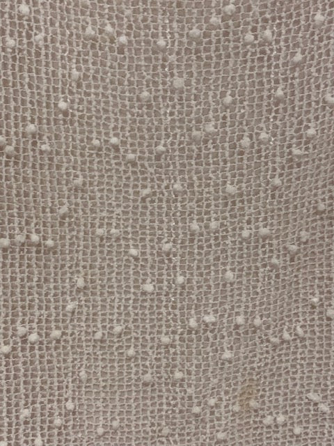 Cream top with peanuts