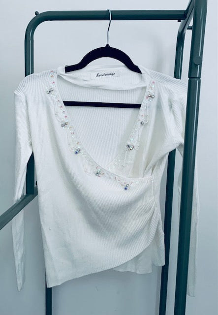 Crossover sweater with sequins